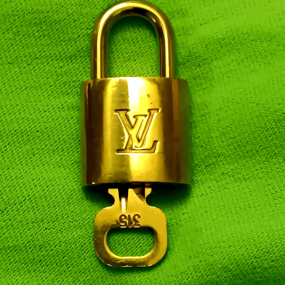 Louis Vuitton Shiny Gold Key Holder